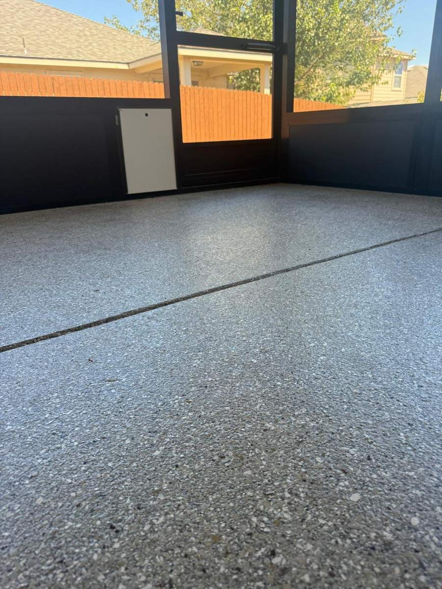 Full-flake coated floor inside the Almanza screen room