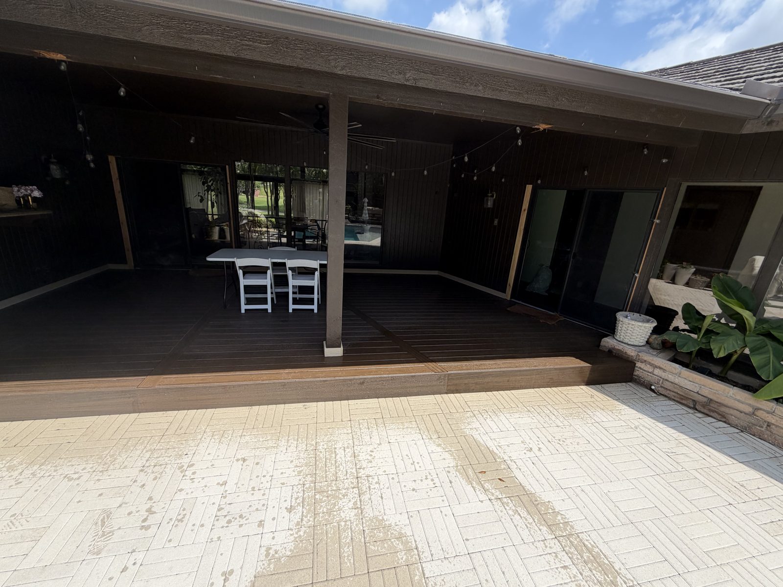 Covered outdoor room with composite deck