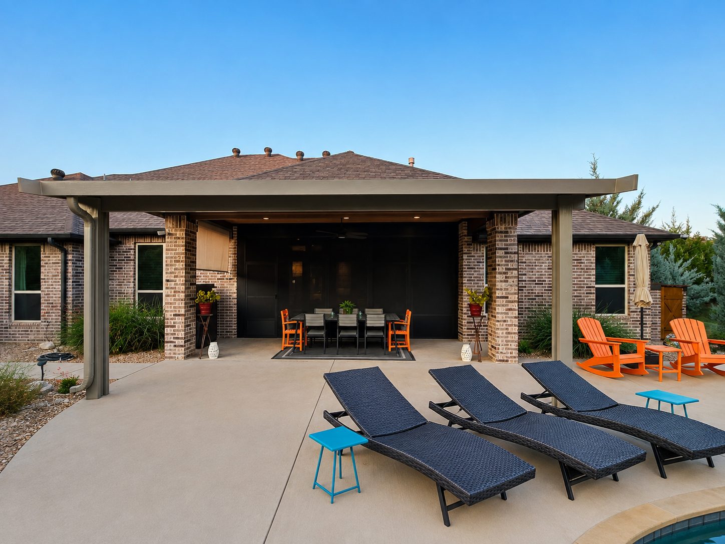 Screened outdoor dining room under patio cover, Granbury TX