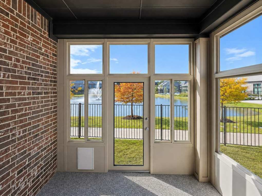 The lake and fountain through the Lakeside glass door