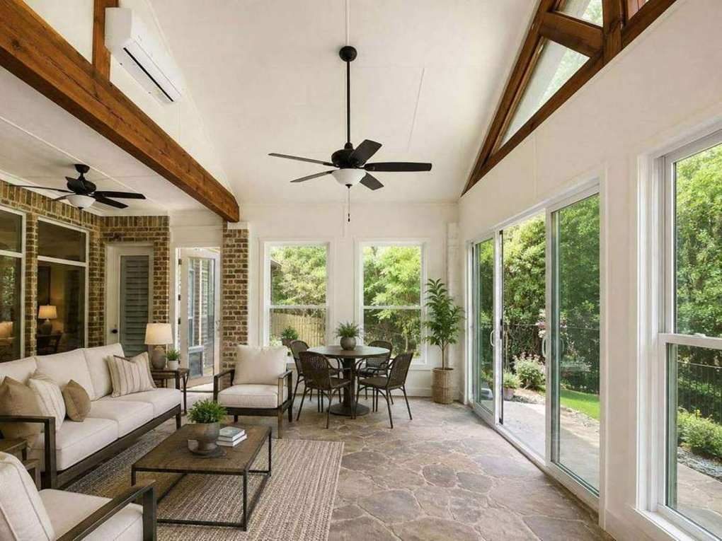Rockwall enclosure interior — white plank ceiling and exposed beams