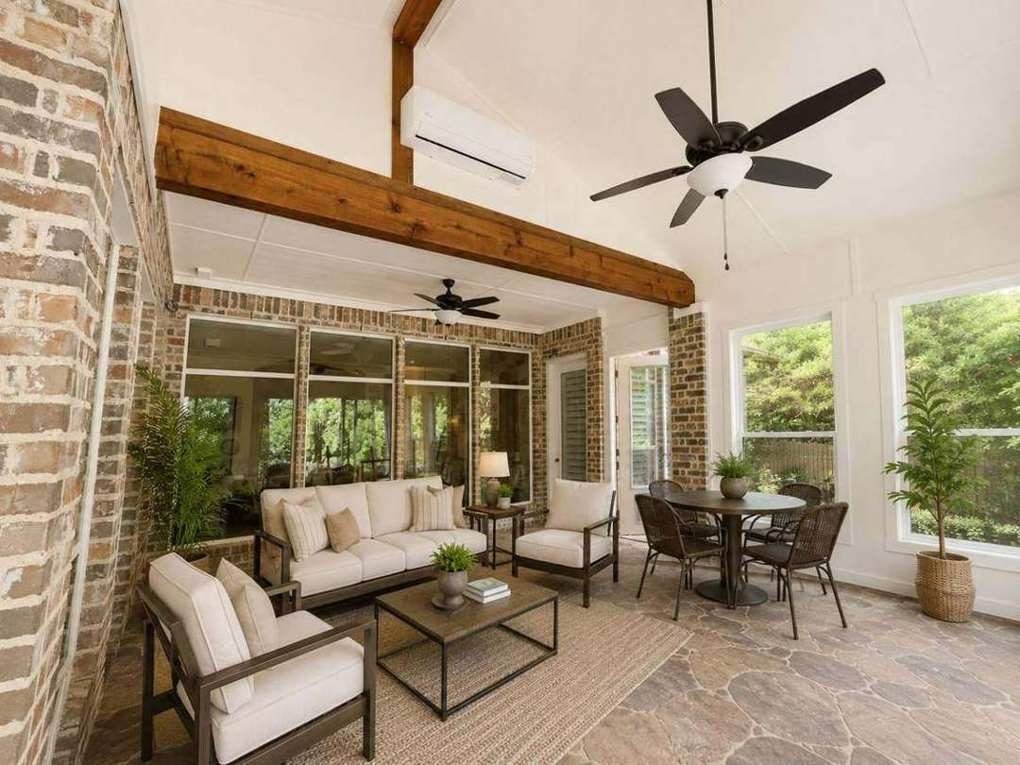 Staged Rockwall interior with cedar beam