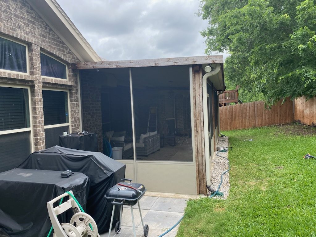 Screened room addition on a Weatherford area home