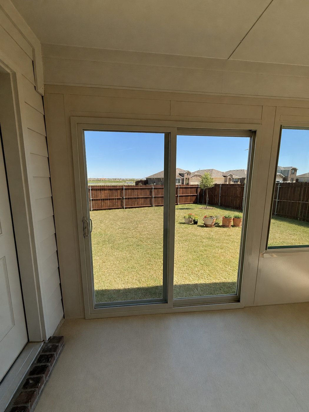 Looking out through the Sidel sliding door to the yard