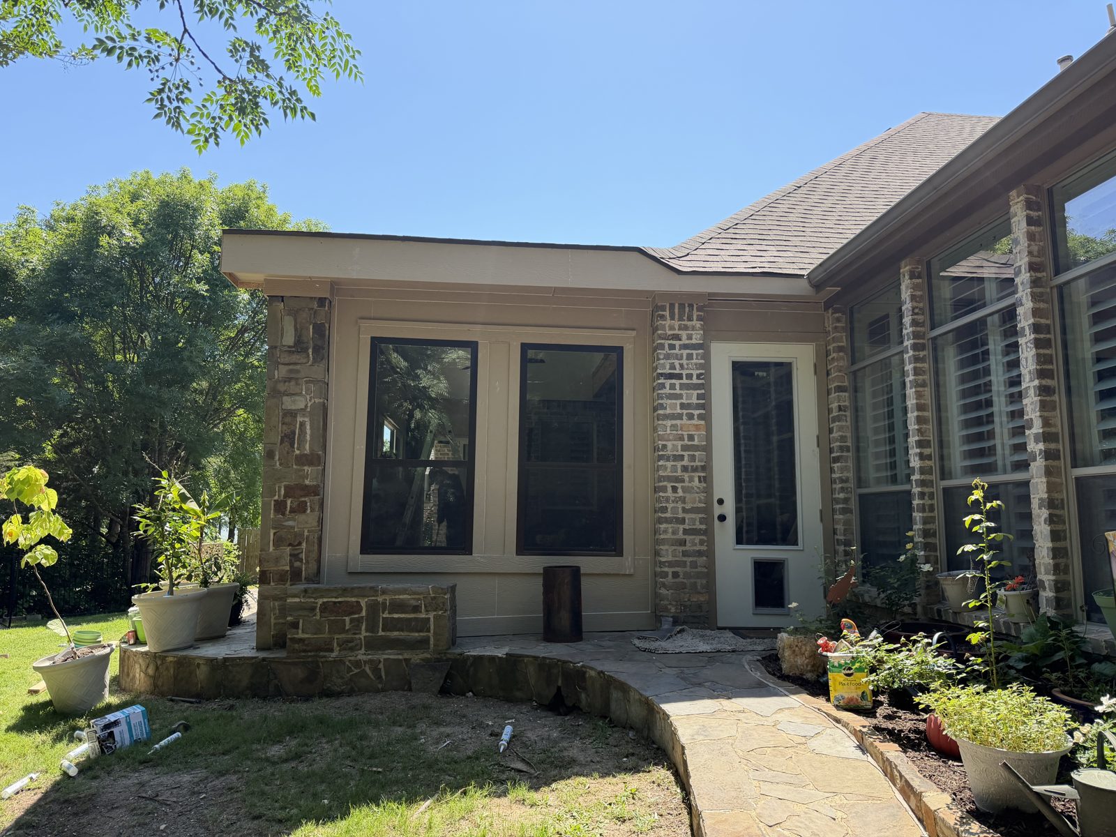 Sunroom enclosure on courtyard patio