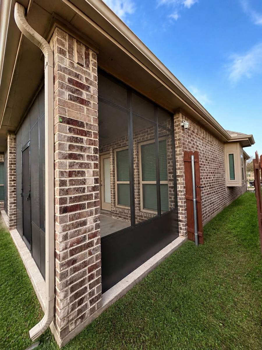 Screened porch corner at the brick column