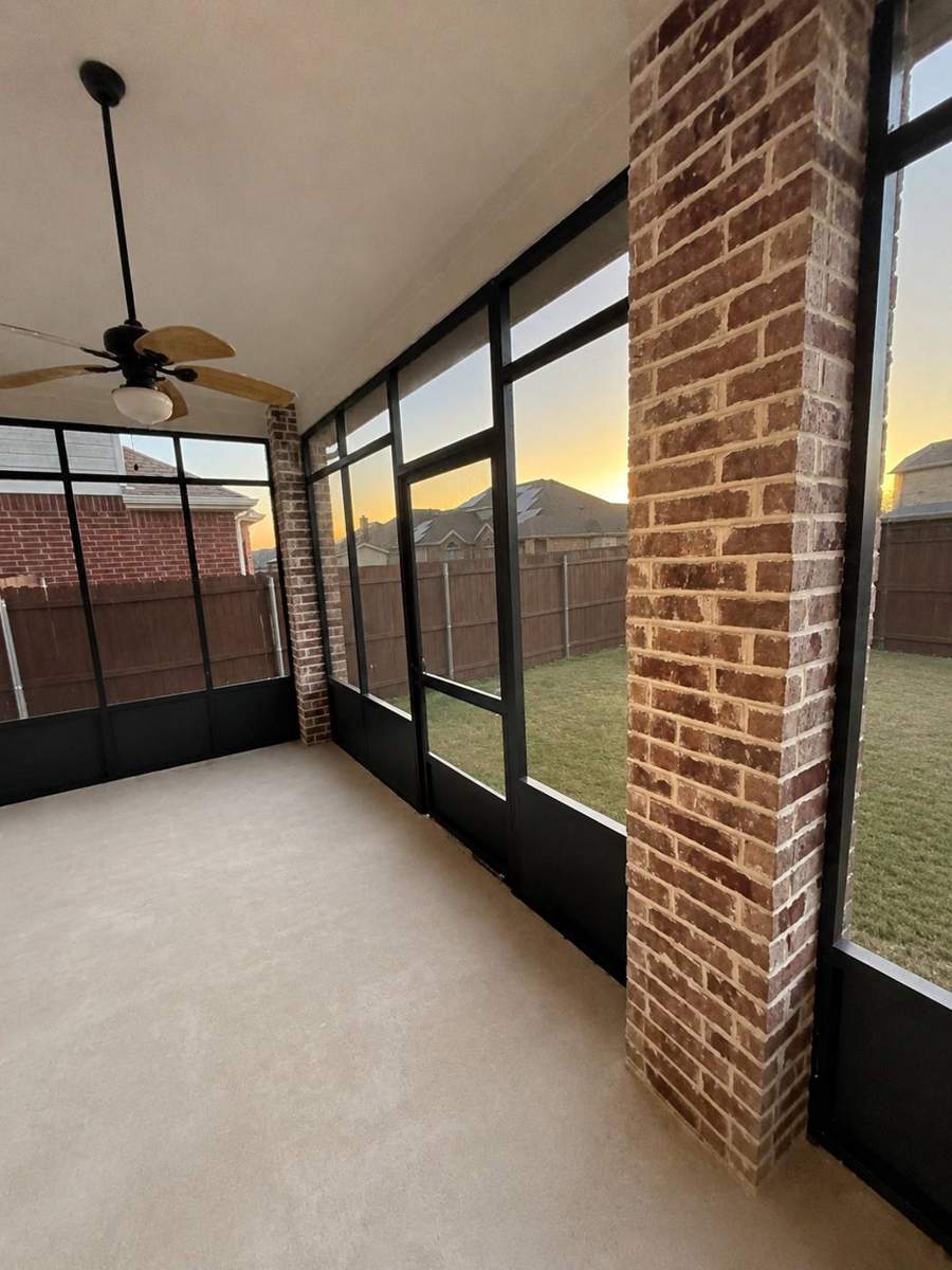 Inside the Wilson screened porch at sunset
